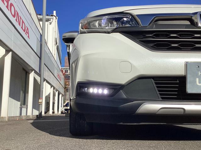 フリード+ハイブリッド ハイブリッド・クロスターホンダセンシング 当店下取 ワンオーナー タイヤ4本新品 純正ギャザズ9インチインターナビ リアカメラ 純正ギャザ11.6インチリア席モニター シートヒーター クルーズコントロール VSA 純正ETC ルーフレール(21枚目)