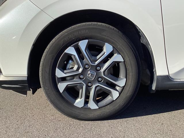 フリード+ハイブリッド ハイブリッド・クロスターホンダセンシング 当店下取 ワンオーナー タイヤ4本新品 純正ギャザズ9インチインターナビ リアカメラ 純正ギャザ11.6インチリア席モニター シートヒーター クルーズコントロール VSA 純正ETC ルーフレール(22枚目)