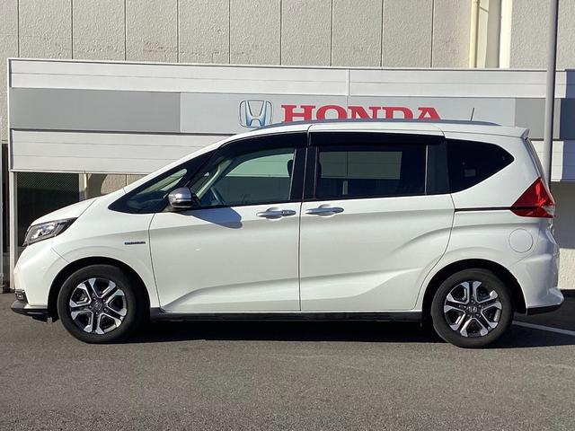 フリード+ハイブリッド ハイブリッド・クロスターホンダセンシング 当店下取 ワンオーナー タイヤ4本新品 純正ギャザズ9インチインターナビ リアカメラ 純正ギャザ11.6インチリア席モニター シートヒーター クルーズコントロール VSA 純正ETC ルーフレール(25枚目)