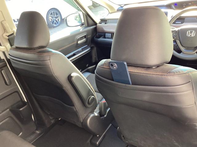 フリード+ハイブリッド ハイブリッド・クロスターホンダセンシング 当店下取 ワンオーナー タイヤ4本新品 純正ギャザズ9インチインターナビ リアカメラ 純正ギャザ11.6インチリア席モニター シートヒーター クルーズコントロール VSA 純正ETC ルーフレール(52枚目)