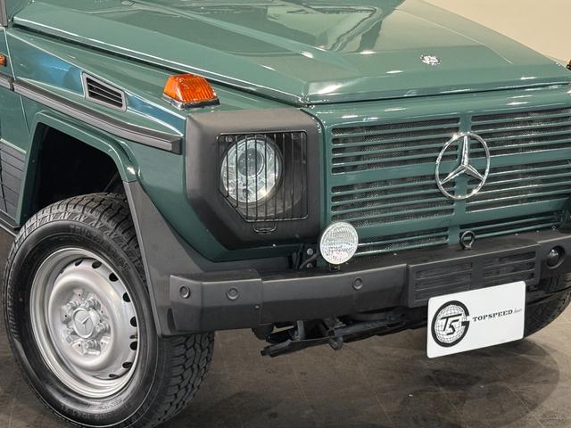 Ｇクラス Ｇ３５０　ブルーテック　エーゲードグリーン全塗装　４ＷＤ車輛　自社オリジナルナローカスタムＳｔｙｌｅ　クラシックグリル　チャック柄シートカバー　１６インチスチールホイール　五角シュラウドヘッドカバー　ヘッドライトカバー（66枚目）
