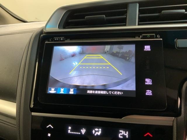 フィットハイブリッド Ｌ　ホンダセンシング　１年保証　純正ナビ　ＴＶ　Ｒカメラ　ＢＴオ－ディオ　ＤＶＤ　ドラレコ　ＥＴＣ　ＬＥＤライト　ＶＳＡ　クルコン　アルミ　フォグ　スマキ－　整備記録簿（6枚目）