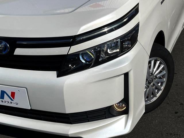 ヴォクシー ハイブリッドＶ　両側電動ドア　純正ＳＤナビ　後席モニター　バックカメラ　衝突被害軽減システム　ドラレコ　スマートキー　ＬＥＤヘッド　ビルトインＥＴＣ　クルコン　オートライト　オートエアコン　純正１５インチアルミ（27枚目）