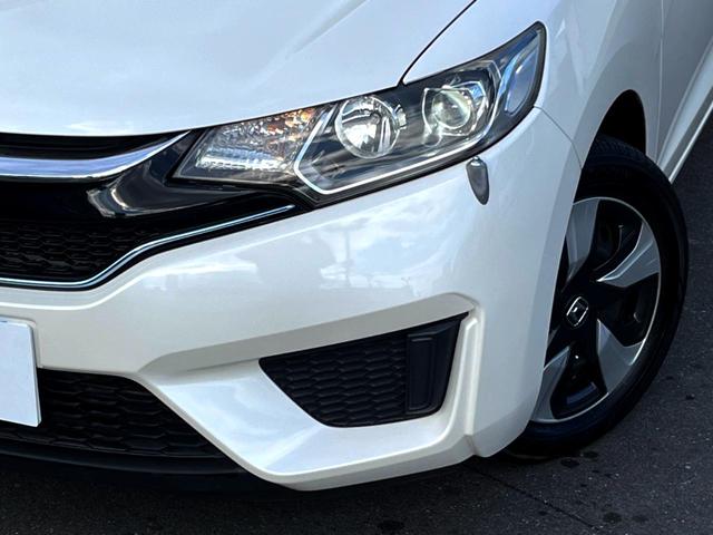 フィットハイブリッド Ｆパッケージ　純正ナビ　バックカメラ　スマートキー　ＥＴＣ　オートライト　オートエアコン　Ｂｌｕｅｔｏｏｔｈ　ＣＤ　ＤＶＤ再生（28枚目）