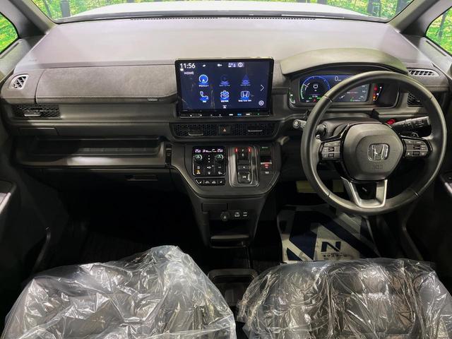 ステップワゴン ｅ：ＨＥＶスパーダ　プレミアムライン　純正１１．４型ナビ　全周囲カメラ　禁煙車　電動リアゲート　両側電動ドア　前中列シートヒーター　ブラインドスポットモニター　シーケンシャルウィンカー　衝突軽減　レーダークルーズ　ＥＴＣ　ドラレコ（2枚目）
