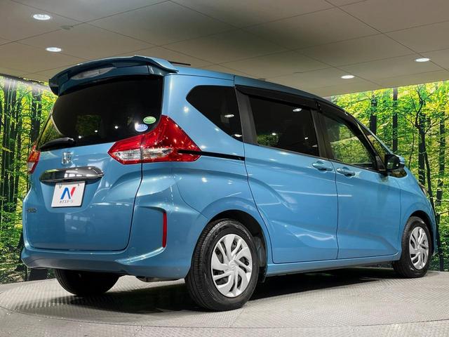 フリード G・ホンダセンシング 純正11.6型後席モニター 純正9型ナビ LEDヘッドライト アクティブコーナリングライト 両側パワースライドドア 禁煙車 衝突軽減 バックカメラ ETC ドライブレコーダー Cパッケージ(17枚目)