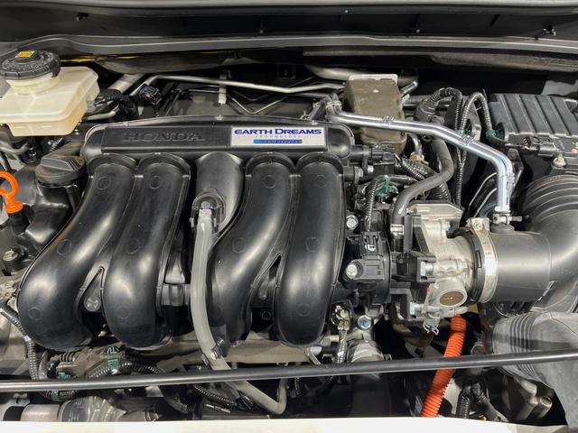 ヴェゼル ハイブリッドRS・ホンダセンシング 純正8型ナビ バックカメラ ETC ドライブレコーダー 前席シートヒーター スマートキー 衝突軽減装置 禁煙車 LEDヘッドライト 純正18インチアルミホイール オートライト フロントフォグランプ(18枚目)
