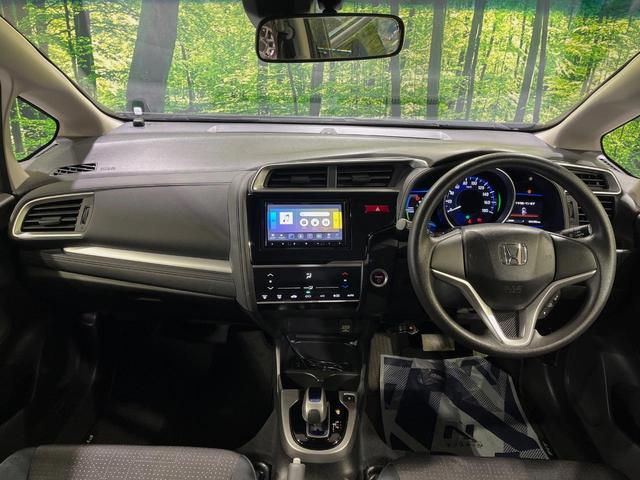 フィットハイブリッド Fパッケージ SDナビ 禁煙車 衝突軽減システム バックカメラ LEDヘッドライト ETC Bluetooth フルセグTV スマートキー プッシュスタート オートエアコン シートリフター チップアップシート(2枚目)