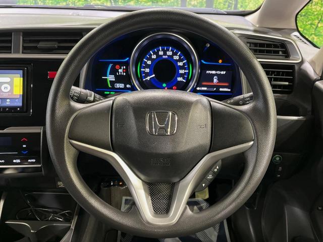 フィットハイブリッド Fパッケージ SDナビ 禁煙車 衝突軽減システム バックカメラ LEDヘッドライト ETC Bluetooth フルセグTV スマートキー プッシュスタート オートエアコン シートリフター チップアップシート(11枚目)