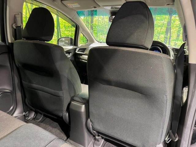 フィットハイブリッド Fパッケージ SDナビ 禁煙車 衝突軽減システム バックカメラ LEDヘッドライト ETC Bluetooth フルセグTV スマートキー プッシュスタート オートエアコン シートリフター チップアップシート(31枚目)