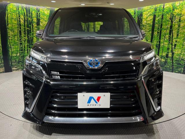 ヴォクシー ハイブリッドＺＳ　煌ＩＩＩ　純正１０型ナビ　純正１２型フリップダウンモニター　禁煙車　衝突軽減システム　クリアランスソナー　バックカメラ　ＥＴＣ　ドラレコ　ハーフレザーシート　リアオートエアコン　ＬＥＤヘッドライト（14枚目）