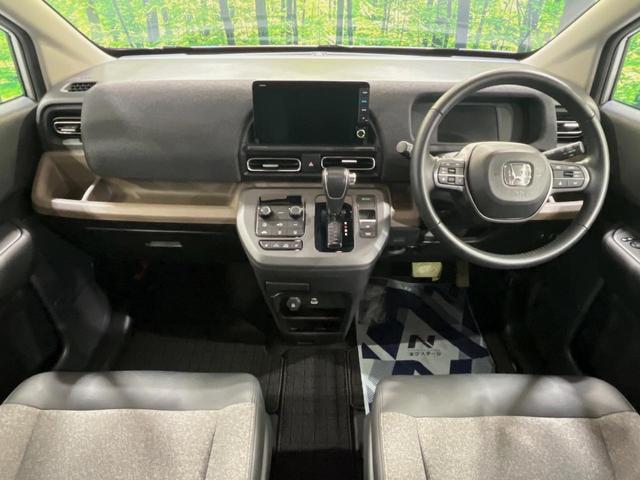 フリード エアー EX 7人 純正9型ナビ 両側電動ドア 禁煙車 バックカメラ ETC リアクーラー ブラインドスポットモニター シートヒーター 純正15インチアルミ ホンダセンシング レーダークルーズ LEDヘッドライト(2枚目)