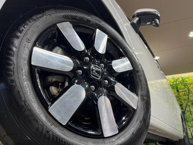 フリード エアー EX 7人 純正9型ナビ 両側電動ドア 禁煙車 バックカメラ ETC リアクーラー ブラインドスポットモニター シートヒーター 純正15インチアルミ ホンダセンシング レーダークルーズ LEDヘッドライト(13枚目)