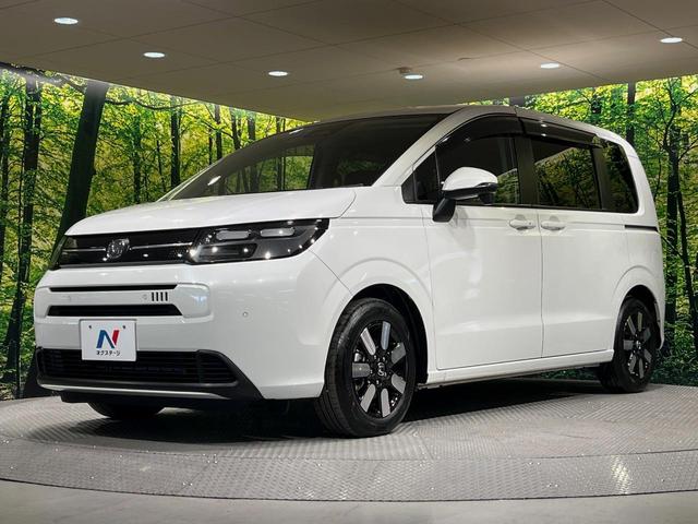 フリード エアー EX 7人 純正9型ナビ 両側電動ドア 禁煙車 バックカメラ ETC リアクーラー ブラインドスポットモニター シートヒーター 純正15インチアルミ ホンダセンシング レーダークルーズ LEDヘッドライト(24枚目)