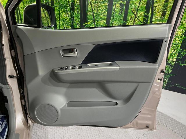 ワゴンＲ ＦＸリミテッド　純正ＣＤオーディオナビ　禁煙車　スマートキー　ヘッドライトレベライザー　ドアバイザー　１４インチアルミホイール　電動格納ドアミラー（33枚目）