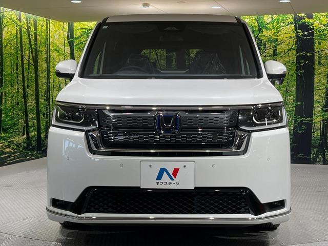 ステップワゴン ｅ：ＨＥＶスパーダ　純正１１．４型ホンダコネクトナビ　登録済未使用車　両側電動ドア　電動リアゲート　後席オットマンシート　シートヒーター　ブラインドスポットモニター　衝突軽減システム　クリアランスソナー　ＬＥＤヘッド（14枚目）