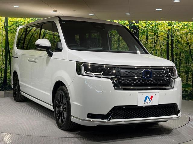 ステップワゴン ｅ：ＨＥＶスパーダ　純正１１．４型ホンダコネクトナビ　登録済未使用車　両側電動ドア　電動リアゲート　後席オットマンシート　シートヒーター　ブラインドスポットモニター　衝突軽減システム　クリアランスソナー　ＬＥＤヘッド（16枚目）