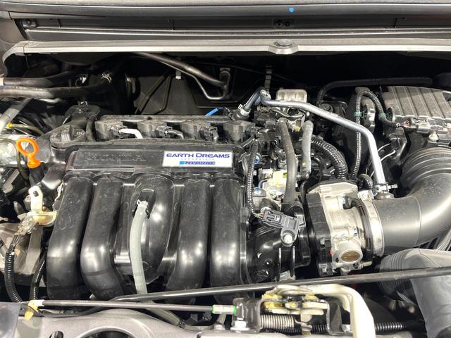 フリードハイブリッド ハイブリッド・Ｇホンダセンシング　純正ナビ　両側電動ドア　バックカメラ　衝突軽減システム　禁煙車　ドラレコ　スマートキー　ＬＥＤヘッド　ＥＴＣ　車線逸脱警報　オートライト　オートエアコン　Ｂｌｕｅｔｏｏｔｈ　ＣＤ　ＤＶＤ再生（19枚目）