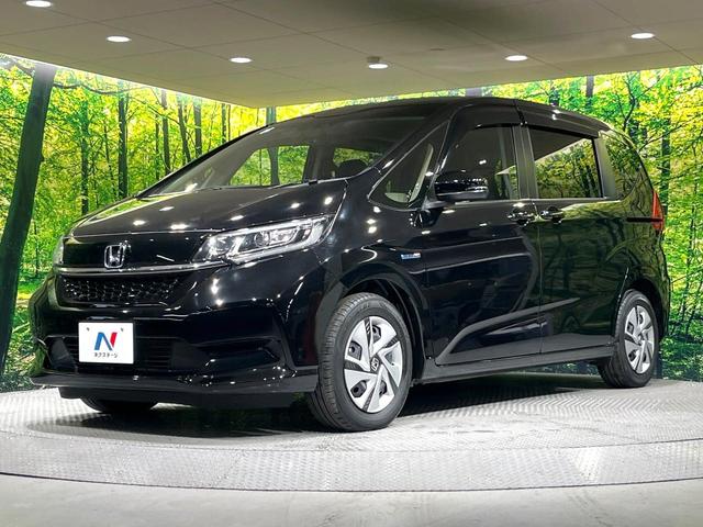 フリードハイブリッド ハイブリッド・Ｇホンダセンシング　純正ナビ　両側電動ドア　バックカメラ　衝突軽減システム　禁煙車　ドラレコ　スマートキー　ＬＥＤヘッド　ＥＴＣ　車線逸脱警報　オートライト　オートエアコン　Ｂｌｕｅｔｏｏｔｈ　ＣＤ　ＤＶＤ再生（29枚目）