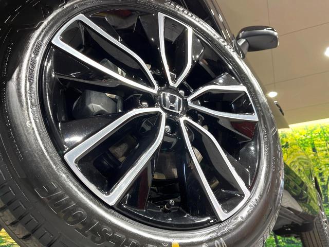 ヴェゼル ｅ：ＨＥＶ　Ｚ　全周囲カメラ　プレミアムオーディオ　メーカーナビ　ＥＴＣ２．０　ワイヤレス充電　登録済未使用車　電動リアゲート　シートヒーター　シーケンシャルウィンカー　ブラインドスポットモニター　後退出庫サポート（14枚目）