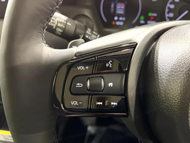 ヴェゼル ｅ：ＨＥＶ　Ｚ　全周囲カメラ　プレミアムオーディオ　メーカーナビ　ＥＴＣ２．０　ワイヤレス充電　登録済未使用車　電動リアゲート　シートヒーター　シーケンシャルウィンカー　ブラインドスポットモニター　後退出庫サポート（27枚目）