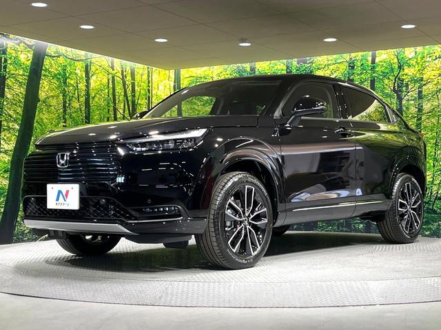 ヴェゼル ｅ：ＨＥＶ　Ｚ　全周囲カメラ　プレミアムオーディオ　メーカーナビ　ＥＴＣ２．０　ワイヤレス充電　登録済未使用車　電動リアゲート　シートヒーター　シーケンシャルウィンカー　ブラインドスポットモニター　後退出庫サポート（52枚目）