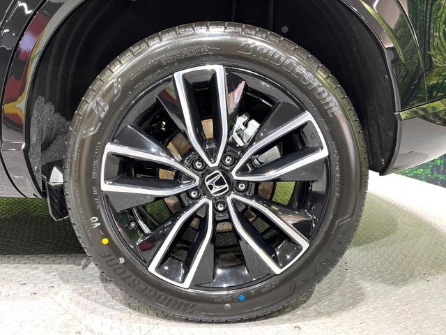 ヴェゼル ｅ：ＨＥＶ　Ｚ　全周囲カメラ　プレミアムオーディオ　メーカーナビ　ＥＴＣ２．０　ワイヤレス充電　登録済未使用車　電動リアゲート　シートヒーター　シーケンシャルウィンカー　ブラインドスポットモニター　後退出庫サポート（56枚目）