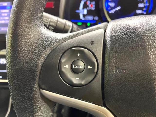 フィットハイブリッド Lパッケージ 純正SDナビ バックカメラ 衝突被害軽減システム 禁煙車 ハーフレザーシート ドライブレコーダー コーナーセンサー スマートキー LEDヘッド ビルトインETC クルーズコントロール オートライト(28枚目)