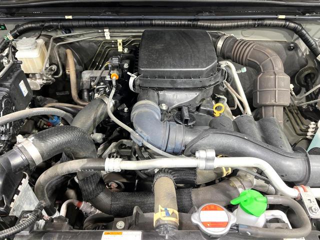 ジムニー XL 純正8型ナビ バックカメラ 衝突軽減システム 禁煙車 スマートキー ETC ハイビームアシスト オートライト オートエアコン フルセグTV Bluetooth 純正マッドフラップ(18枚目)