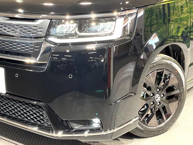 ステップワゴン スパーダ　登録済未使用車　純正１１．４型ナビ　両側電動ドア　バックカメラ　衝突被害軽減システム　コーナーセンサー　ブラインドスポットモニター　電動リアゲート　ＬＥＤヘッド　純正１６インチアルミ（12枚目）