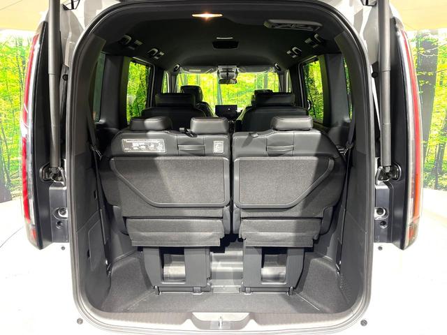 ステップワゴン スパーダ　登録済未使用車　純正１１．４型ナビ　両側電動ドア　電動リアゲート　バックカメラ　衝突軽減システム　ブラインドスポットモニター　レーダークルーズ　コーナーセンサー　ＬＥＤヘッド　純正１６インチアルミ（11枚目）