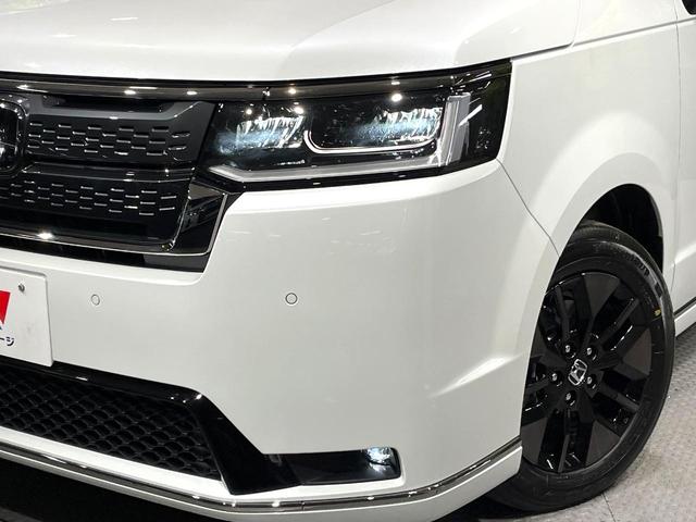 ステップワゴン スパーダ　登録済未使用車　純正１１．４型ナビ　両側電動ドア　電動リアゲート　バックカメラ　衝突軽減システム　ブラインドスポットモニター　レーダークルーズ　コーナーセンサー　ＬＥＤヘッド　純正１６インチアルミ（12枚目）