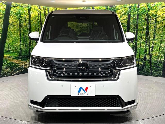 ステップワゴン スパーダ　登録済未使用車　純正１１．４型ナビ　両側電動ドア　電動リアゲート　バックカメラ　衝突軽減システム　ブラインドスポットモニター　レーダークルーズ　コーナーセンサー　ＬＥＤヘッド　純正１６インチアルミ（14枚目）