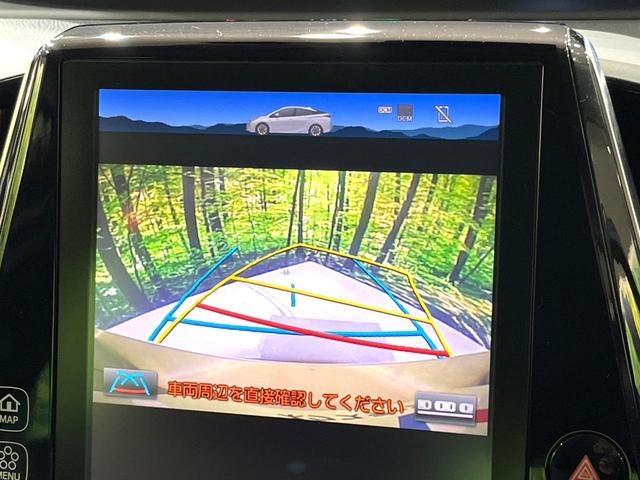プリウス Ａツーリングセレクション　純正１１．６型ナビ　１００Ｖ電源　衝突軽減　レーダークルーズ　禁煙車　パワーシート　ブラインドスポットモニター　コーナーセンサー　ワイヤレス充電　ＬＥＤヘッド　ＥＴＣ２．０　ドラレコ　バックカメラ（4枚目）