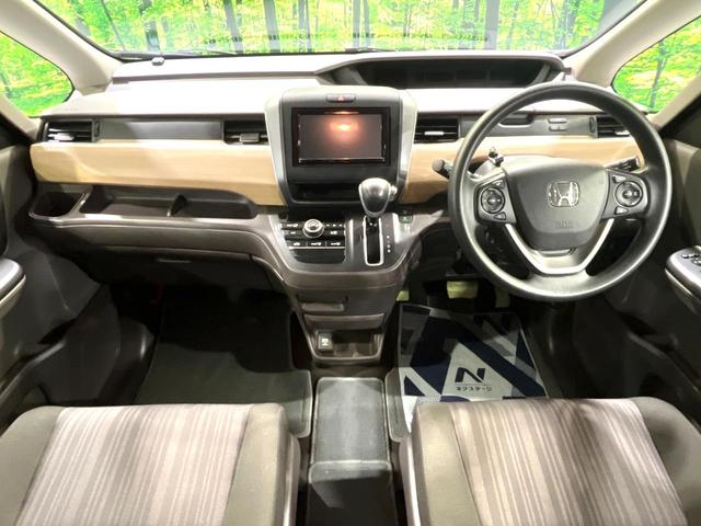 フリード Ｇ・ホンダセンシング　両側電動ドア　ＳＤナビ　バックカメラ　衝突被害軽減システム　禁煙車　ドラレコ　スマートキー　ＬＥＤヘッド　ビルトインＥＴＣ　車線逸脱警報　オートライト　オートエアコン　Ｂｌｕｅｔｏｏｔｈ　ＣＤ（2枚目）