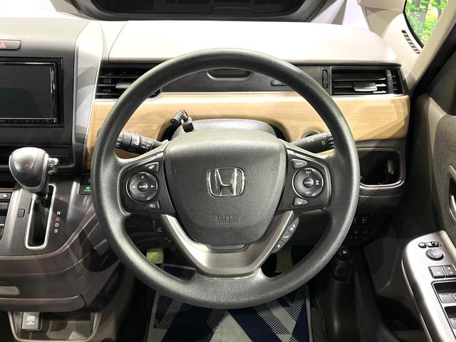 フリード Ｇ・ホンダセンシング　両側電動ドア　ＳＤナビ　バックカメラ　衝突被害軽減システム　禁煙車　ドラレコ　スマートキー　ＬＥＤヘッド　ビルトインＥＴＣ　車線逸脱警報　オートライト　オートエアコン　Ｂｌｕｅｔｏｏｔｈ　ＣＤ（12枚目）