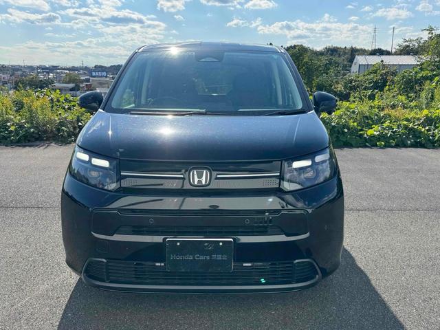 フリード エアー　ＥＸ　９インチ純正ナビ　ＥＴＣ　バックカメラ　ナビ　ＴＶ　クリアランスソナー　オートクルーズコントロール　レーンアシスト　衝突被害軽減システム　両側電動スライドドア　ＬＥＤヘッドランプ　スマートキー（3枚目）