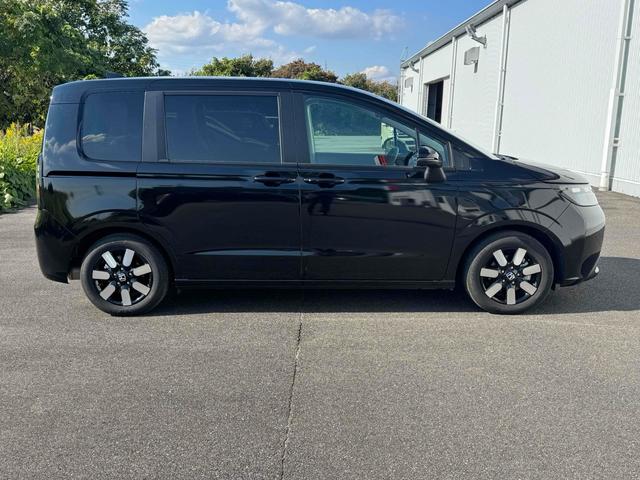 フリード エアー　ＥＸ　９インチ純正ナビ　ＥＴＣ　バックカメラ　ナビ　ＴＶ　クリアランスソナー　オートクルーズコントロール　レーンアシスト　衝突被害軽減システム　両側電動スライドドア　ＬＥＤヘッドランプ　スマートキー（5枚目）