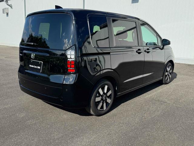 フリード エアー　ＥＸ　９インチ純正ナビ　ＥＴＣ　バックカメラ　ナビ　ＴＶ　クリアランスソナー　オートクルーズコントロール　レーンアシスト　衝突被害軽減システム　両側電動スライドドア　ＬＥＤヘッドランプ　スマートキー（6枚目）