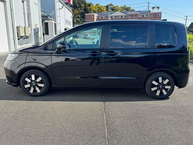 フリード エアー　ＥＸ　９インチ純正ナビ　ＥＴＣ　バックカメラ　ナビ　ＴＶ　クリアランスソナー　オートクルーズコントロール　レーンアシスト　衝突被害軽減システム　両側電動スライドドア　ＬＥＤヘッドランプ　スマートキー（9枚目）