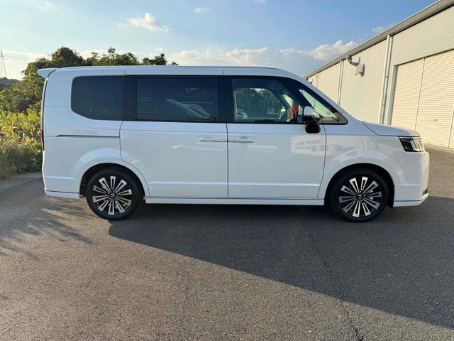 ステップワゴン スパーダ　プレミアムライン　１１インチ純正ナビ　ＥＴＣ　バックカメラ　ナビ　ＴＶ　クリアランスソナー　オートクルーズコントロール　衝突被害軽減システム　両側電動スライドドア　ＬＥＤヘッドランプ　スマートキー　シートヒーター（5枚目）