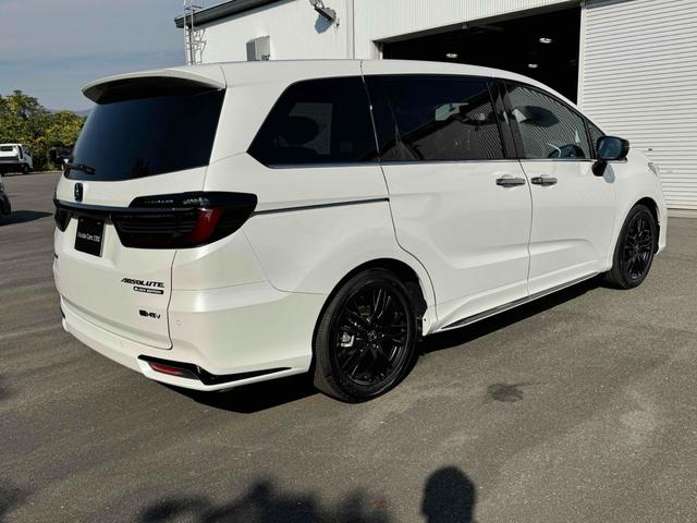 オデッセイハイブリッド ｅ：ＨＥＶアブソルート・ＥＸブラックエディション　ハイブリッド　両側電動スライドドア　クリアランスソナー　オートクルーズコントロール　レーンアシスト　衝突被害軽減システム　ＬＥＤヘッドランプ　電動リアゲート　スマートキー　ＣＶＴ　盗難防止システム（10枚目）