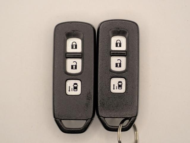 Ｎ－ＢＯＸカスタム Ｇ・Ｌパッケージ　社外ナビ　フルセグＴＶ　ＢＴ接続可能　バックカメラ　左側パワスラ　ＨＩＤオートライト　インテリキー　プッシュスタート　純正１４インチアルミ　スペアキー（8枚目）