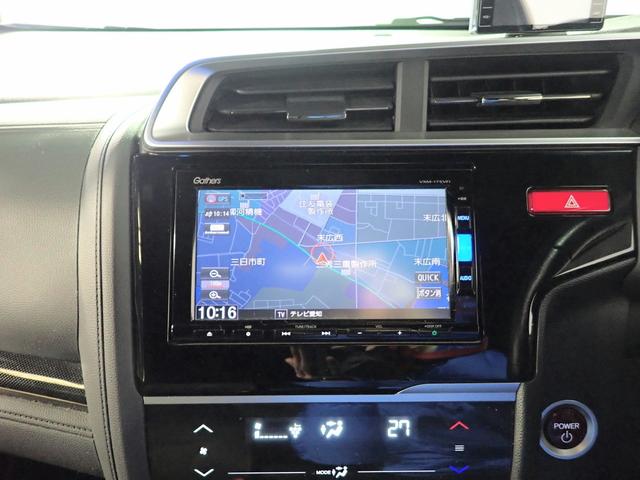 フィットハイブリッド Ｓパッケージ　純正ナビ　フルセグＴＶ　ＢＴ接続　バックカメラ　ＥＴＣ　ワンオーナー　安心パッケージ　ＬＥＤオートライト　クルーズＣ　インテリキー　プッシュスタート　アイドリングストップ　純正アルミ　禁煙車（5枚目）