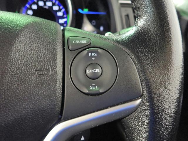 フィットハイブリッド Ｓパッケージ　純正ナビ　フルセグＴＶ　ＢＴ接続　バックカメラ　ＥＴＣ　ワンオーナー　安心パッケージ　ＬＥＤオートライト　クルーズＣ　インテリキー　プッシュスタート　アイドリングストップ　純正アルミ　禁煙車（14枚目）