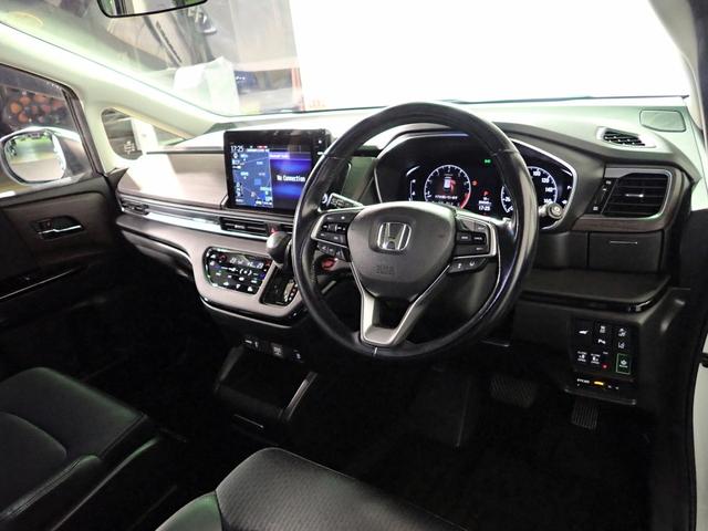 オデッセイ アブソルート・ＥＸ　７人乗り　純正ナビ　フルセグＴＶ　ＵＳＢ＆ＢＴ＆ＨＤＭＩ接続　マルチビューカメラ　ＥＴＣ２．０　フリップダウンモニター　ホンダセンシング　パワーテールゲート　レーダーＣＣ　両側パワスラ　純正アルミ（21枚目）