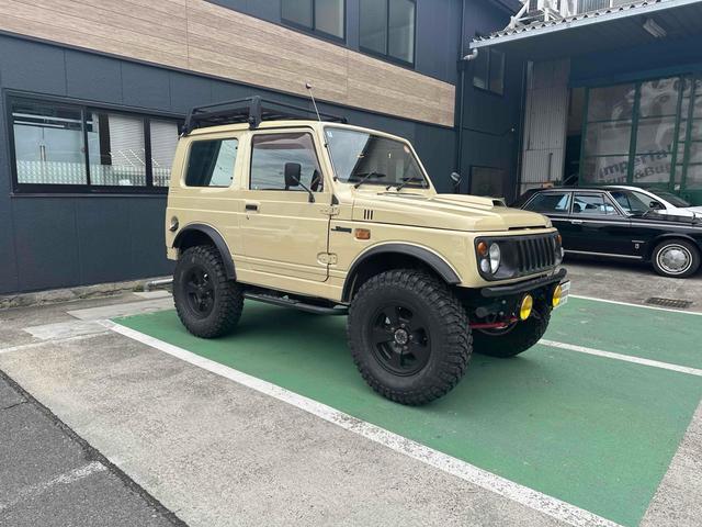 ジムニー ワイルドウインド エンジンオーバーホール済み オリジナルレザーシート 4WD MT CD アルミホイール エアコン(25枚目)