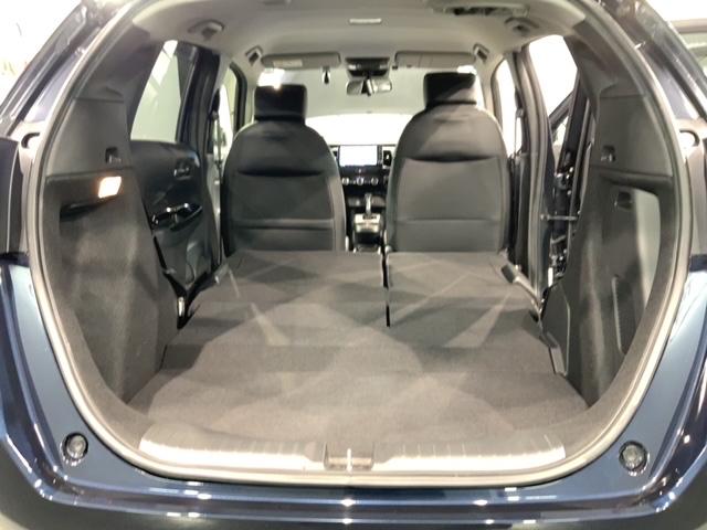 フィット e:HEVホーム 禁煙1オーナー 車検整備付 1年保証 ドラレコ ナビVXU-215FTi TV Rカメラ CD BTオ-ディオ DVD ETC LEDオートライト VSA クルコン スマキー 盗難防止装置 保証書取説(18枚目)