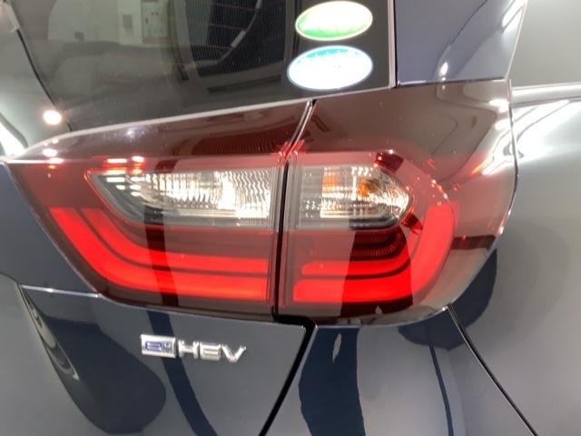 フィット e:HEVホーム 禁煙1オーナー 車検整備付 1年保証 ドラレコ ナビVXU-215FTi TV Rカメラ CD BTオ-ディオ DVD ETC LEDオートライト VSA クルコン スマキー 盗難防止装置 保証書取説(45枚目)