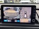 e:HEVアブソルート・EX 当店試乗車 9インチ純正ナビ マルチビューカメラシステム ETC ブラックエンブレム 無限フロアマット フロントグリル交換済 両側パワースライドドア 運転席助手席2列目シートヒーター(12枚目)